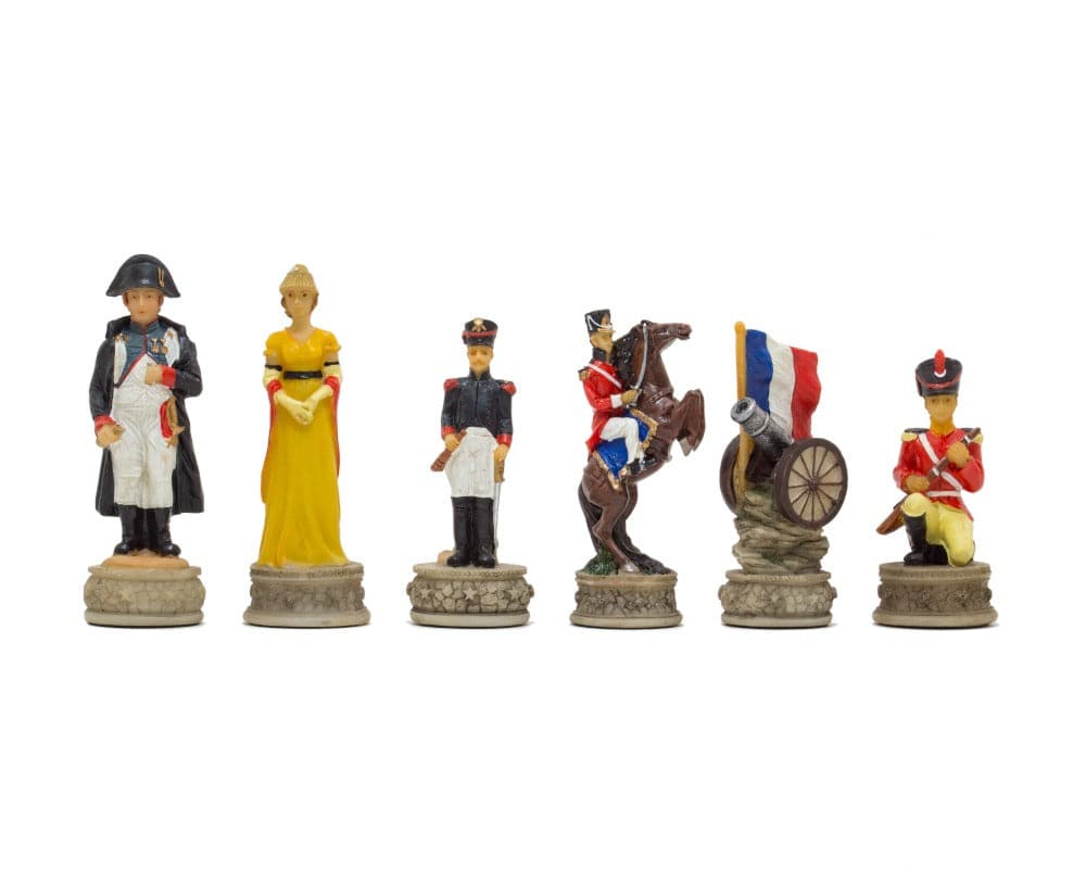 Hand painted Battle of Waterloo themed chess pieces by Italfama in navy and red uniforms, featuring Napoleon Bonaparte and companions.