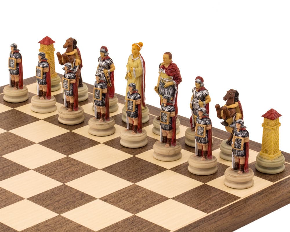 Romans Vs Egyptians themed hand-painted chess pieces by Italfama on wooden chessboard, featuring detailed Roman soldiers and leaders