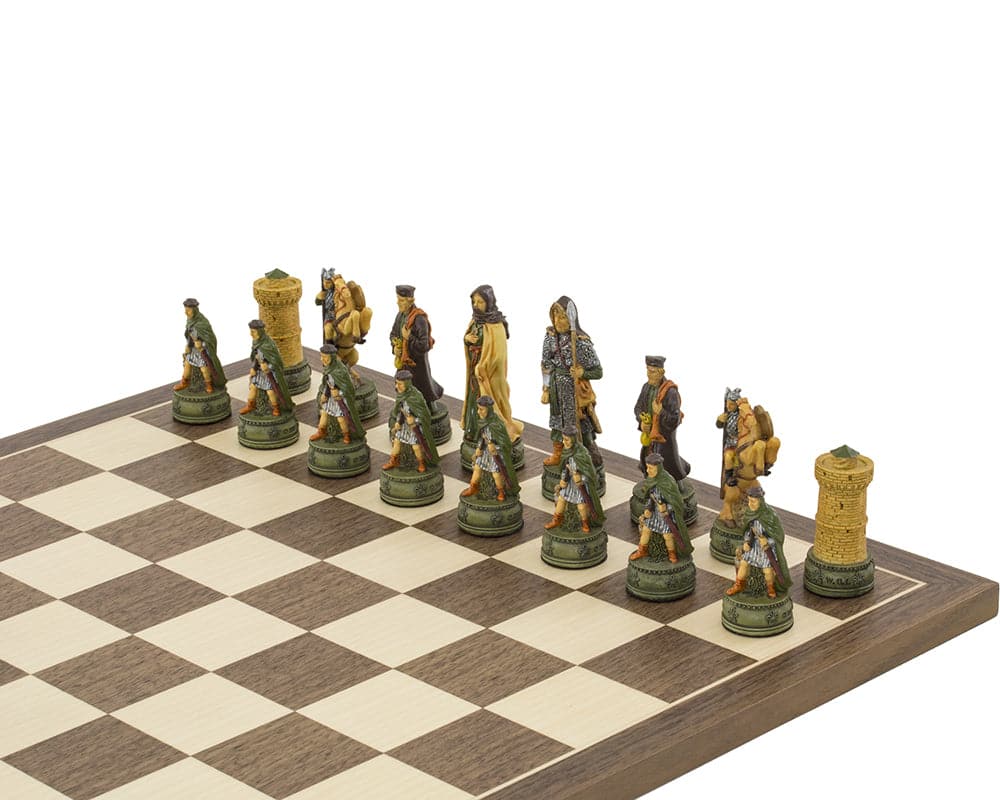 The Camelot Hand painted King Arthur themed chess pieces by Italfama on chessboard, intricately detailed and crafted in Florence, Italy