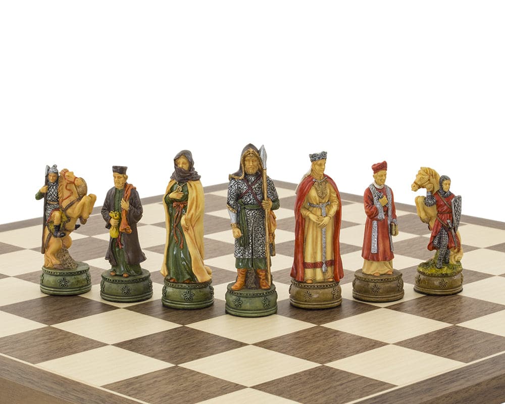 Hand-painted Camelot themed chess pieces by Italfama on a chessboard