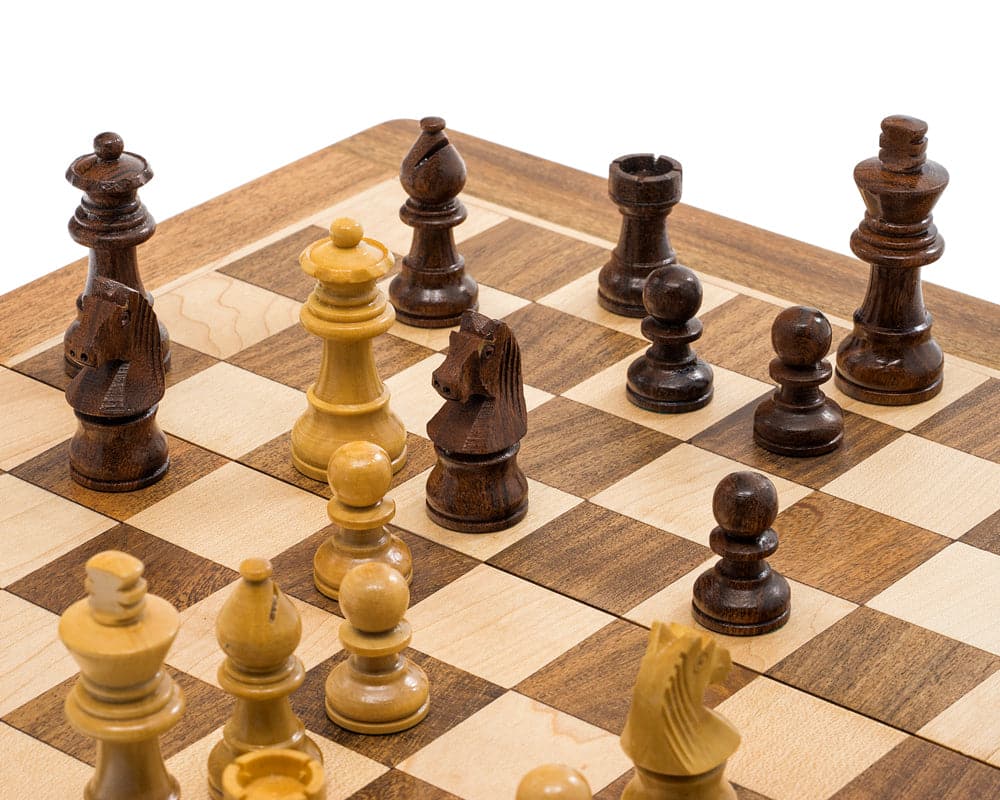 Deluxe hardwood folding travel chess set with magnetic pieces on an inlaid wooden board.