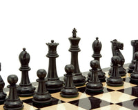 Victoria Series Ebonised Boxwood Chessmen 3.75 Inches displayed on a chessboard, featuring intricate craftsmanship and felted bases.