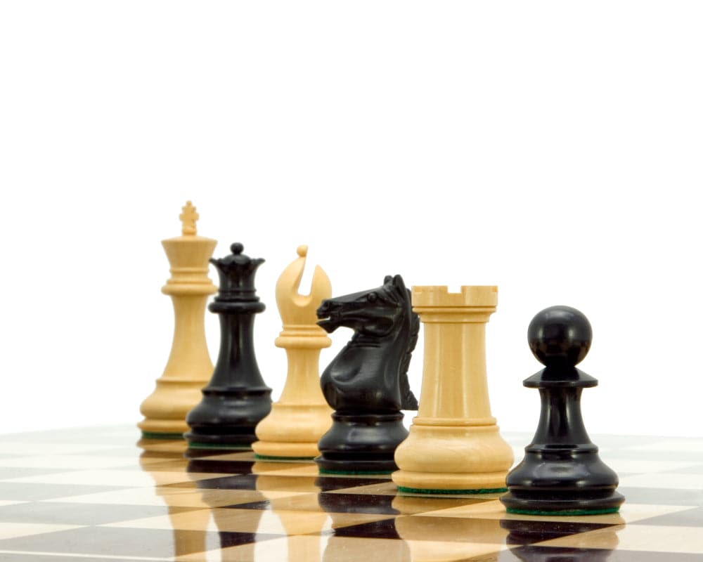 Sentinel Series Ebony and Boxwood Staunton Chess Pieces 4 Inches - Classic Black and White Chessmen on Board