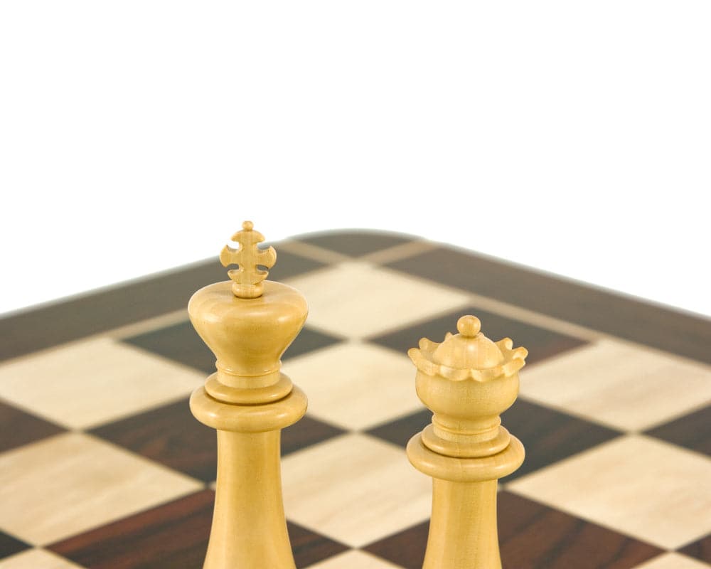 Monarch Series Ebony and Boxwood luxury chess king and queen on chessboard