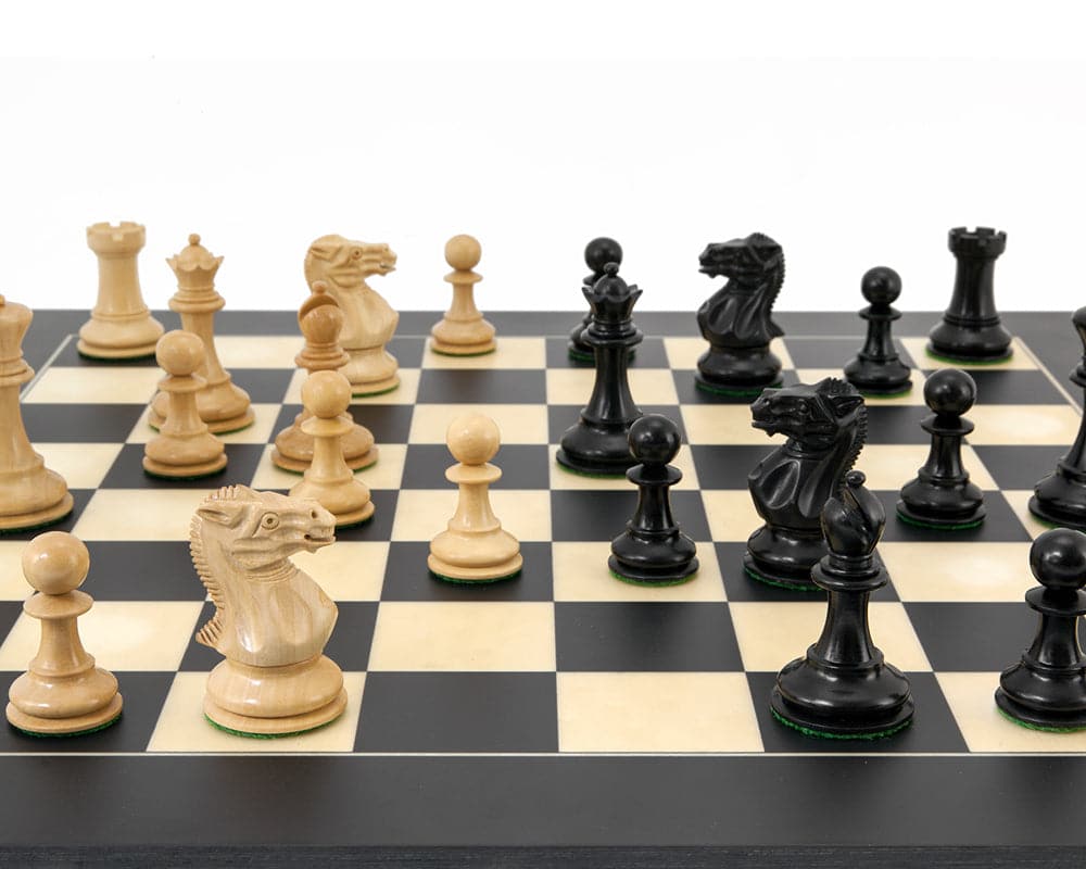 Highgrove Series Ebony and Boxwood Staunton Chess Pieces on a 20 inch chessboard