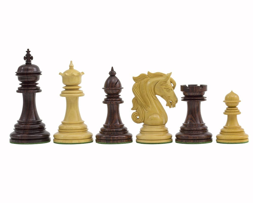 The Kingsgate Rosewood Chessmen 4.25 inch ornate pieces including king, queen, bishop, knight, rook, and pawn. Handcrafted from rosewood.