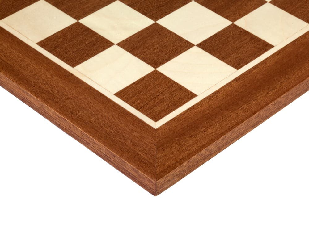 Wooden chess board corner with polished finish and contrasting squares