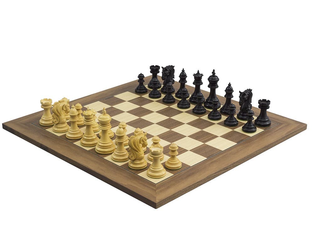 The Kingsgate Ebony and Walnut Chess Set with ornate chessmen on a deluxe walnut and maple board displaying a timeless classic look.