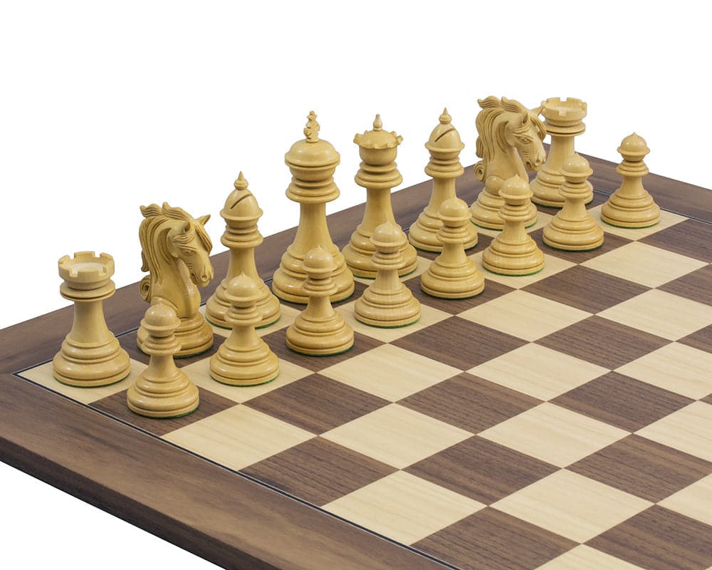 The Kingsgate Ebony and Walnut Chess Set with ornate chessmen on a 21.7-inch walnut and maple board.