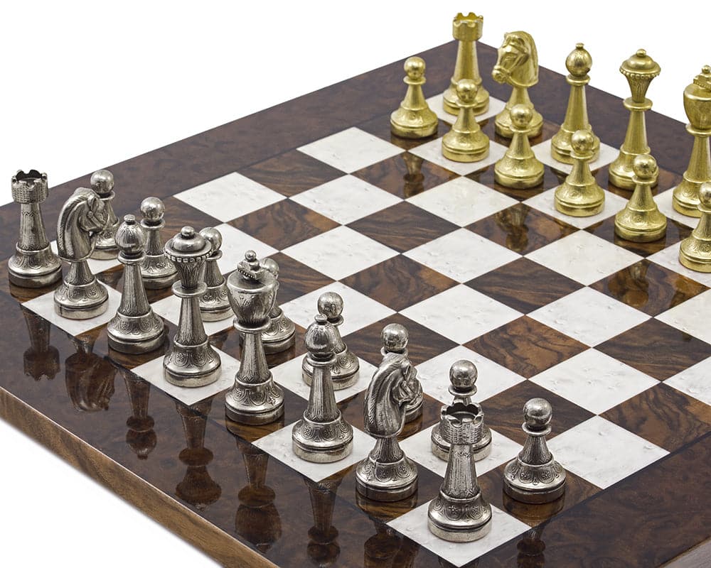 The Finnesburg and Dark Walnut Luxury Chess Set on 17-inch Briarwood board with solid brass and nickel-plated pieces in play.