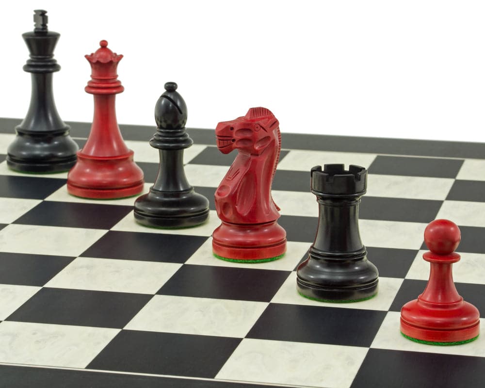 Red and Black Broadbase Chess Set on black and maple board with 3.75 inch king and weighted pieces