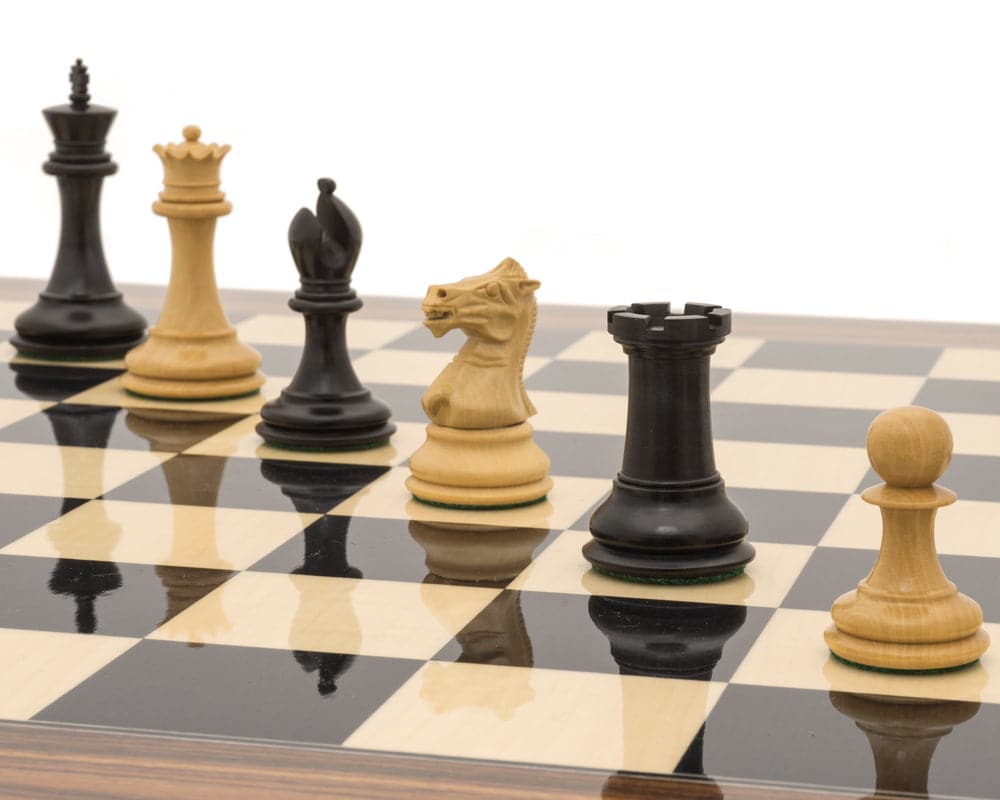 The Sovereign Palisander Staunton chess set on a black anegre and palisander board, showcasing expertly crafted and ebonized boxwood chess pieces.