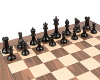 Handcrafted ebony Staunton chess set on a deluxe walnut and maple board, featuring a 4-inch king with reproduction â€˜kingâ€™s crownâ€™ markings.