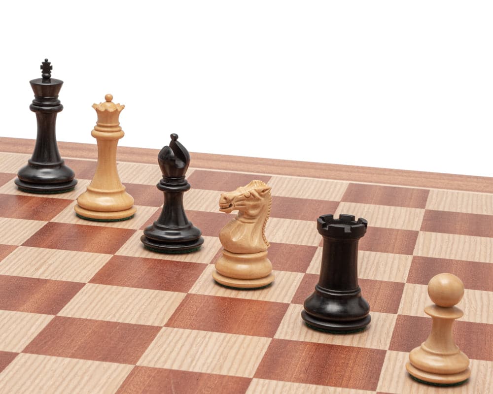 The Sovereign Black and Mahogany Staunton Chess Set pieces on a beautifully crafted 20 inch board with 2 inch playing squares.