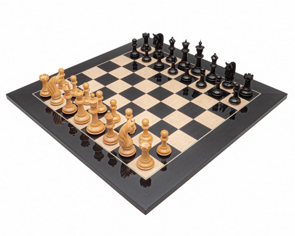 The Blackburne Ebony and Black Anegre Chess Set on luxury board with exquisite detailing and perfectly weighted pieces.