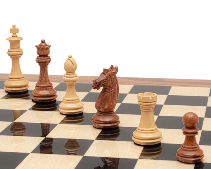 The Trapani Golden Rosewood, Black Anegre and Palisander Chess Set pieces on high-quality board with Staunton design and 3.35 inch king.