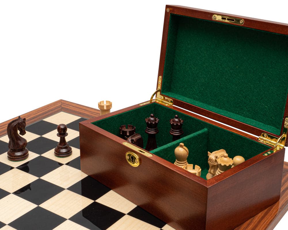 The Leningrad Anjan and Palisander luxury chess set with open cabinet on large Montgoy Palisander board with 2.5 inch squares.