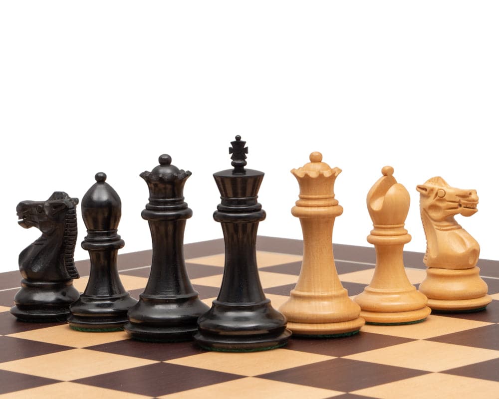 The Sovereign Ebony and Wenge Luxury Chess Set positioned on a high-quality Wenge and Maple board. Classic Staunton design pieces, 3-inch king.