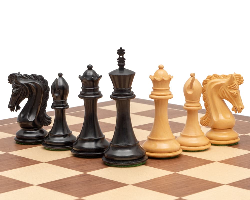 The Canterbury Knight Ebony and Walnut Luxury Chess Set with 4.5 inch king and 2 additional queens displayed on a high-grade board.