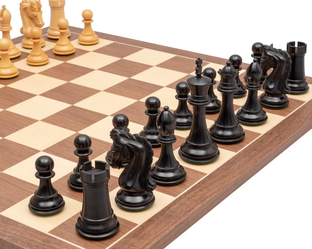 The Canterbury Knight Ebony and Walnut Luxury Chess Set, featuring a 4.5 inch king, 2 additional queens, on a Walnut and Maple board with 2.3 inch squares.