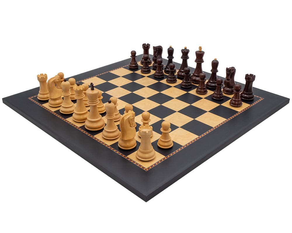 The Queens Gambit Chess Set on Rechapados Ferrer Board with dark decorative border